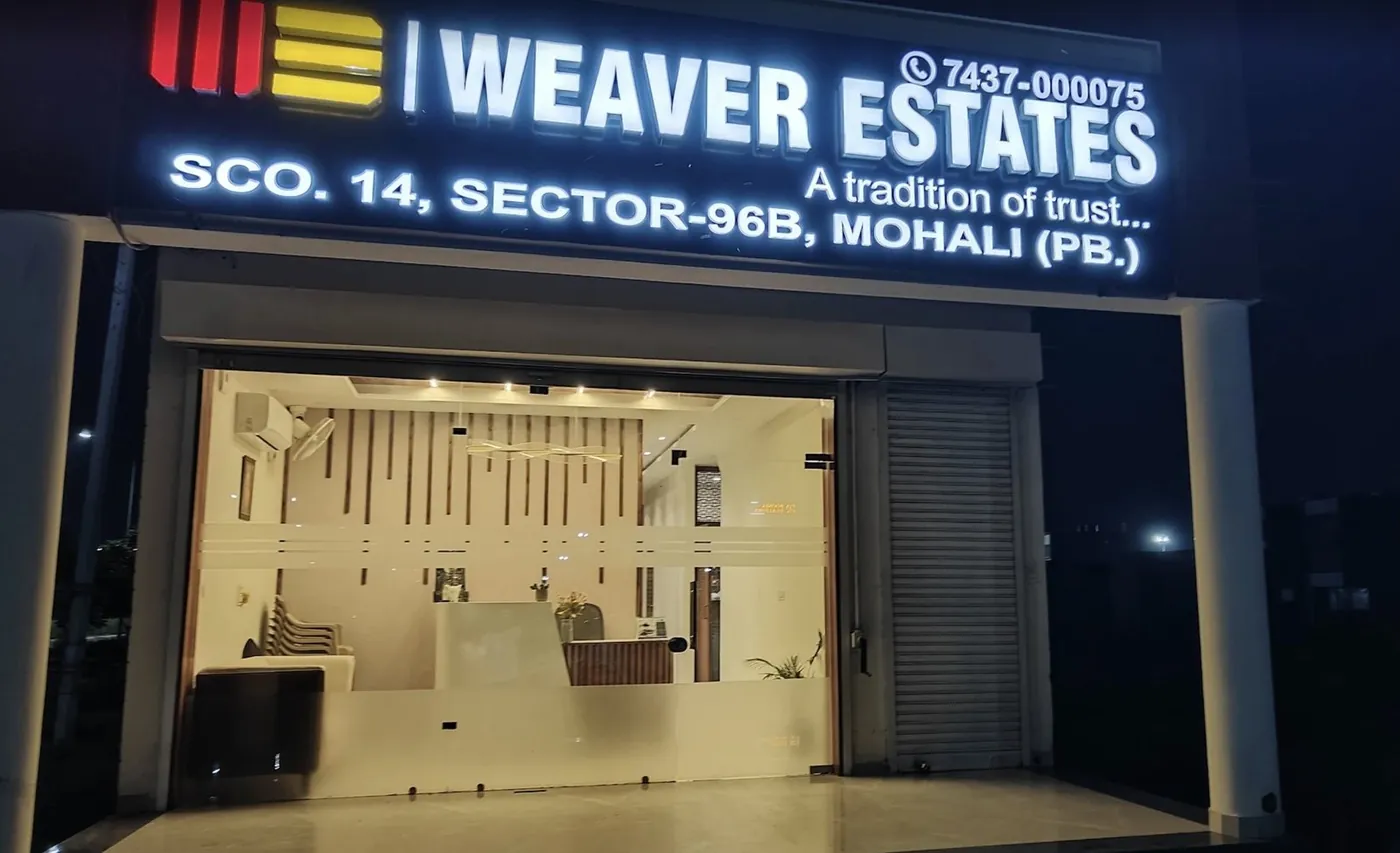 Weaver Estates office at SCO 14, Sector 96B, Mohali, lit up at night